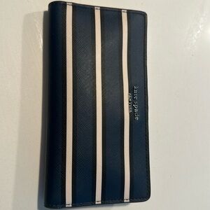 Kate Spade medium size wallet. Classic stripped navy, black and tan.